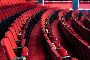 separated theater seats because of corona virus measures - obrazy, fototapety, plakaty