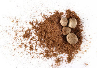 Pile ground, milled nutmeg powder isolated on white background, top view 