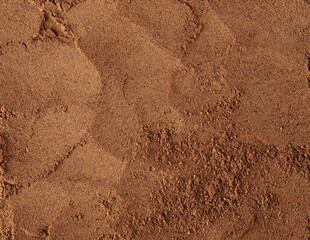 Pile ground, milled nutmeg powder background and texture, top view 