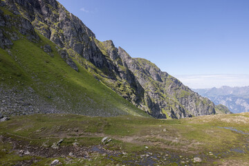 Naklejka premium Amazing hiking day in one of the most beautiful area in Switzerland called Pizol in the canton of Saint Gallen. What a wonderful landscape in Switzerland at a sunny day.