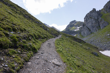 Obraz premium Amazing hiking day in one of the most beautiful area in Switzerland called Pizol in the canton of Saint Gallen. What a wonderful landscape in Switzerland at a sunny day.