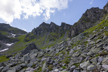 Amazing hiking day in one of the most beautiful area in Switzerland called Pizol in the canton of Saint Gallen. What a wonderful landscape in Switzerland at a sunny day.