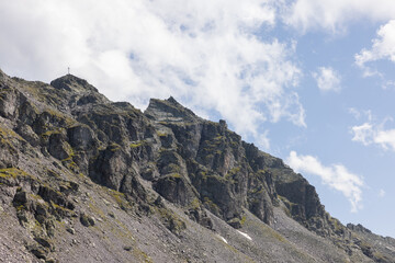 Fototapeta premium Amazing hiking day in one of the most beautiful area in Switzerland called Pizol in the canton of Saint Gallen. What a wonderful landscape in Switzerland at a sunny day.