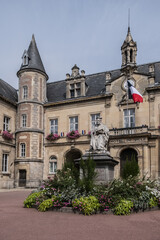Fototapeta na wymiar Current Melun Town Hall (Hotel de Ville), combining neoclassical and neo-Renaissance styles, was built between 1846 – 1848. Melun, Seine-et-Marne department, Ile-de-France region, France.
