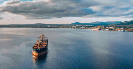 Large cargo ship in the White sea aerial view. © owr