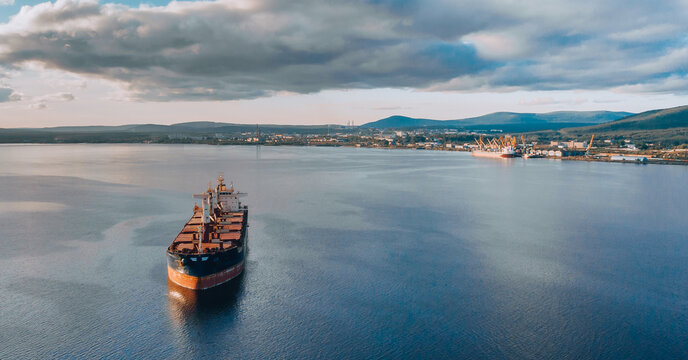 Large cargo ship in the White sea aerial view.