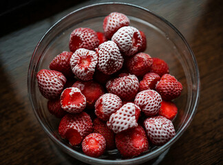 chilled strawberries in a glass plate