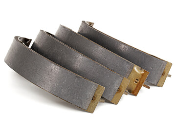 Set of asbestos brake pads, replacement spare parts of the car brake system, isolated on white...