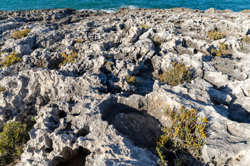 Rocky coast of Gargano, Puglia, Italy. Sedimentary rock. Background.