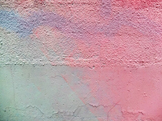 Purple, pink and blue painted textured and smooth wall as background or texture