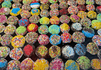 Background of colorful Easter cakes (traditional kulich, paska easter bread)