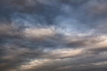 Fototapeta premium Big white fluffy clouds in the blue sky.Summer background.
