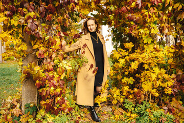 woman wolking in autumn park 