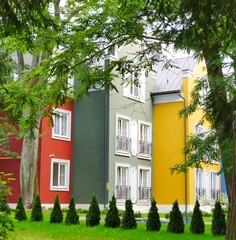 colored houses on the street of a small town