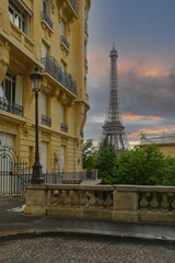 Fototapeta na wymiar View of Eiffel Tower on street in Paris. Eiffel Tower is an architecture and landmark of Paris.
