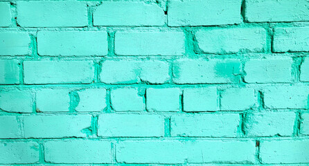 Close-up of a brick wall background in azure color. Azure brick wall texture