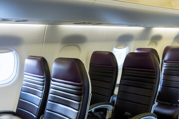 Fototapeta premium Left armchairs in a built-in chairs Aircraft Cabin Economy class