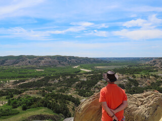 Man standing at the Oxbow Overlook in the north unit of the Theodore Roosevelt National Park in North Dakota