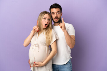 Naklejka premium Young couple pregnant and thinking