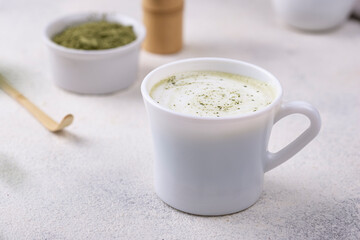 Green healthy matcha latte drink