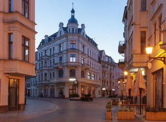 Fototapeta premium Torun. Old market square and town hall at sunrise.