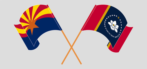 Crossed and waving flags of the State of Arizona and the State of Mississippi