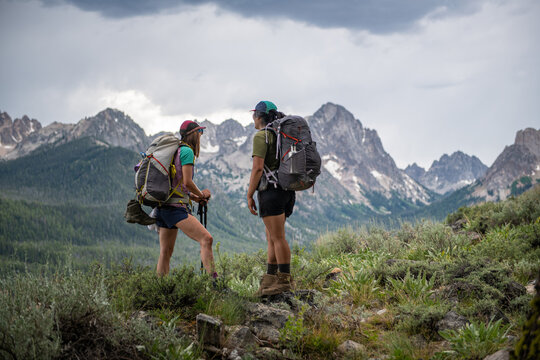 Two women backpacking at Sawtooths Stanley Idaho.