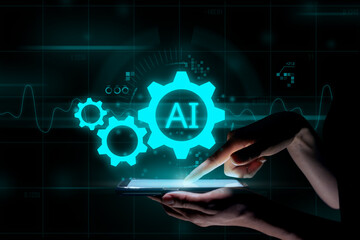 Fototapeta premium Artificial intelligence or ai concept. Futuristic icon design and graphics over hand with tablet