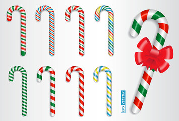 Fototapeta premium set of realistic candy cane christmas isolated or crossed sweet candy tied with a bow or sweet traditional gift christmas holiday. eps vector