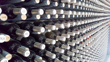 wine bottles on a rack