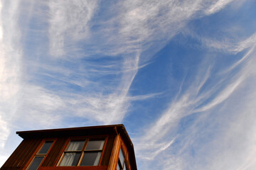 Rustic House and blue skies above