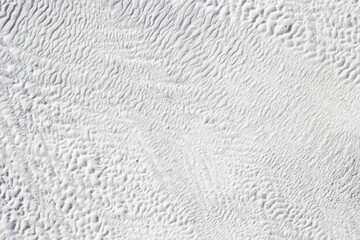 White texture of abstract background of Pamukkale calcium travertine in Turkey.