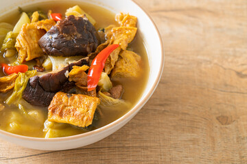 boiled pickled cabbage and bitter gourd soup