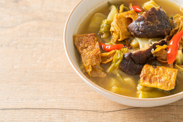 boiled pickled cabbage and bitter gourd soup