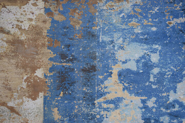 Rustic urban concrete wall with decayed grunge paint effect
