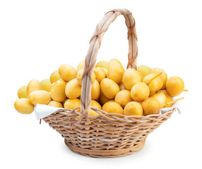Branch of Yellow date palm in the basket isolated on white background, Fresh yellow date palm fruit isolated on white background With clipping path.