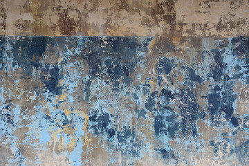 Rustic urban concrete wall with decayed grunge paint effect
