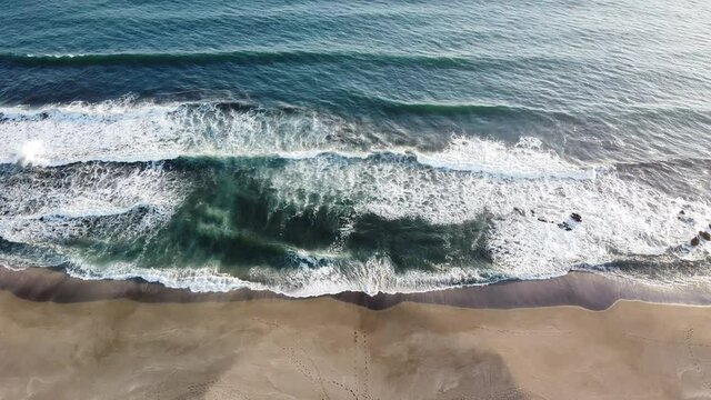 A drone shot from the hotels zoom up to the Pacific Ocean