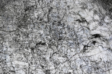 Stone pattern full frame, natural black and white, used as background.