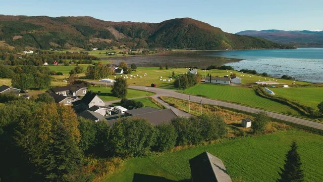 Small rural village of Skjerstad in Northern Norway, drone fly over