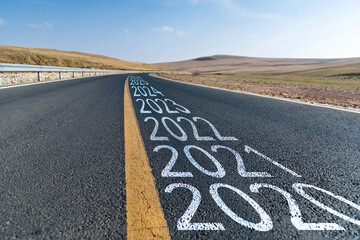 Empty asphalt highway with number 2020, 2021 to 2026