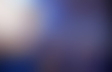 Dark blue night sky with low diffused light. Blurred background.