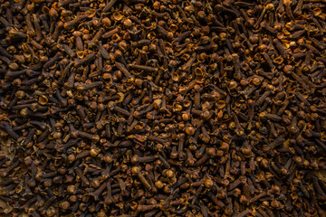 Freshly dryed clove spice texture close up.