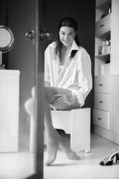 Beautiful lady woman sit on the chair and wear nude stockings