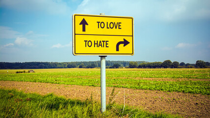Obraz premium Street Sign TO LOVE versus TO HATE