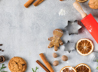  Christmas background with gingerbread, spices, flour. Copy space. New year concept.