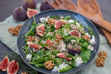 healthy barley salad with fresh figs, feta cheese and walnuts