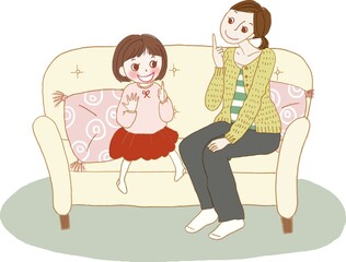 ソファーに座って話をする親子。