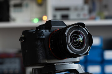 Fototapeta na wymiar DSLR mirrorless camera with wide-angle lens