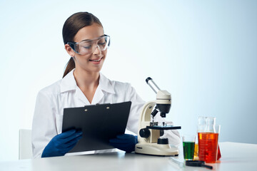 woman doctor medicine research microscope